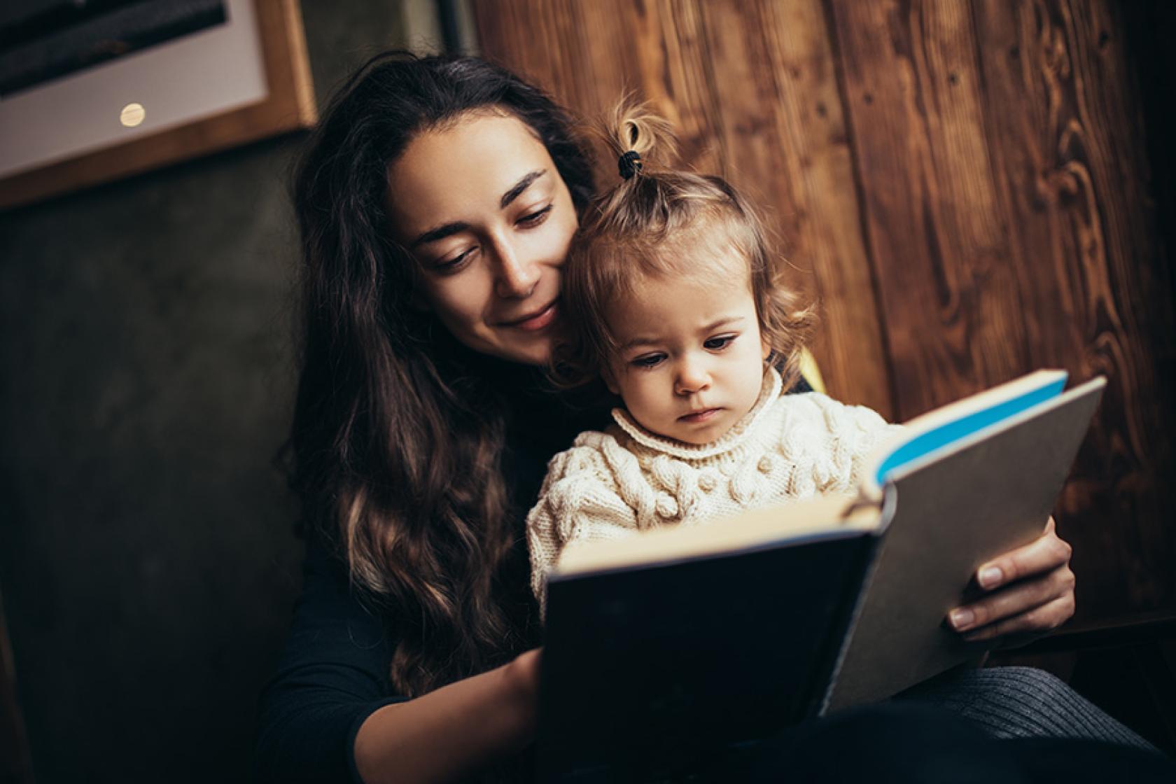 A New Mexican Mom reading to her daughter.